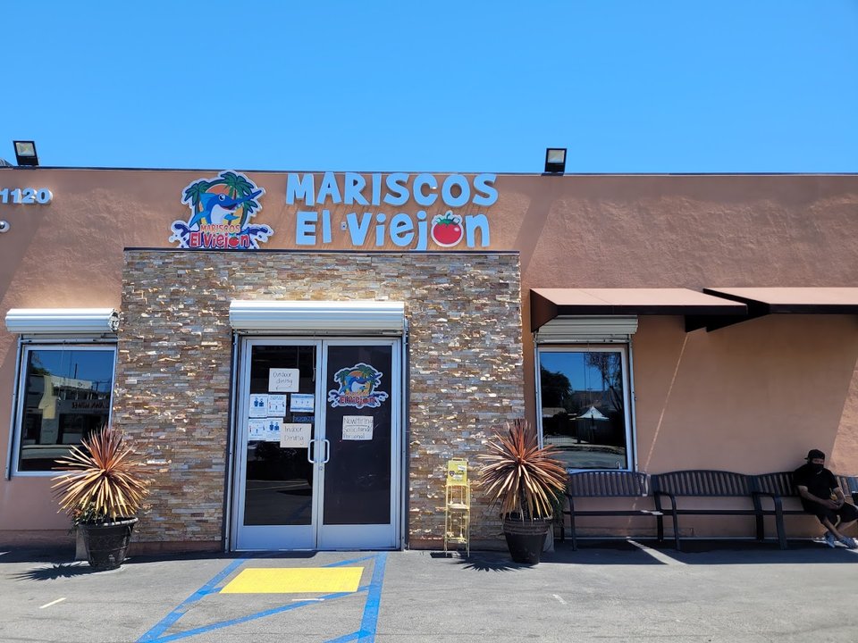 Bright Mexican seafood restaurant with outdoor seating.